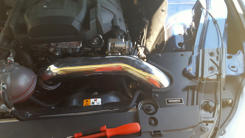 Mishimoto Cold Air Intake. Yes, it’s CARB certified, not that I need that in Texas.